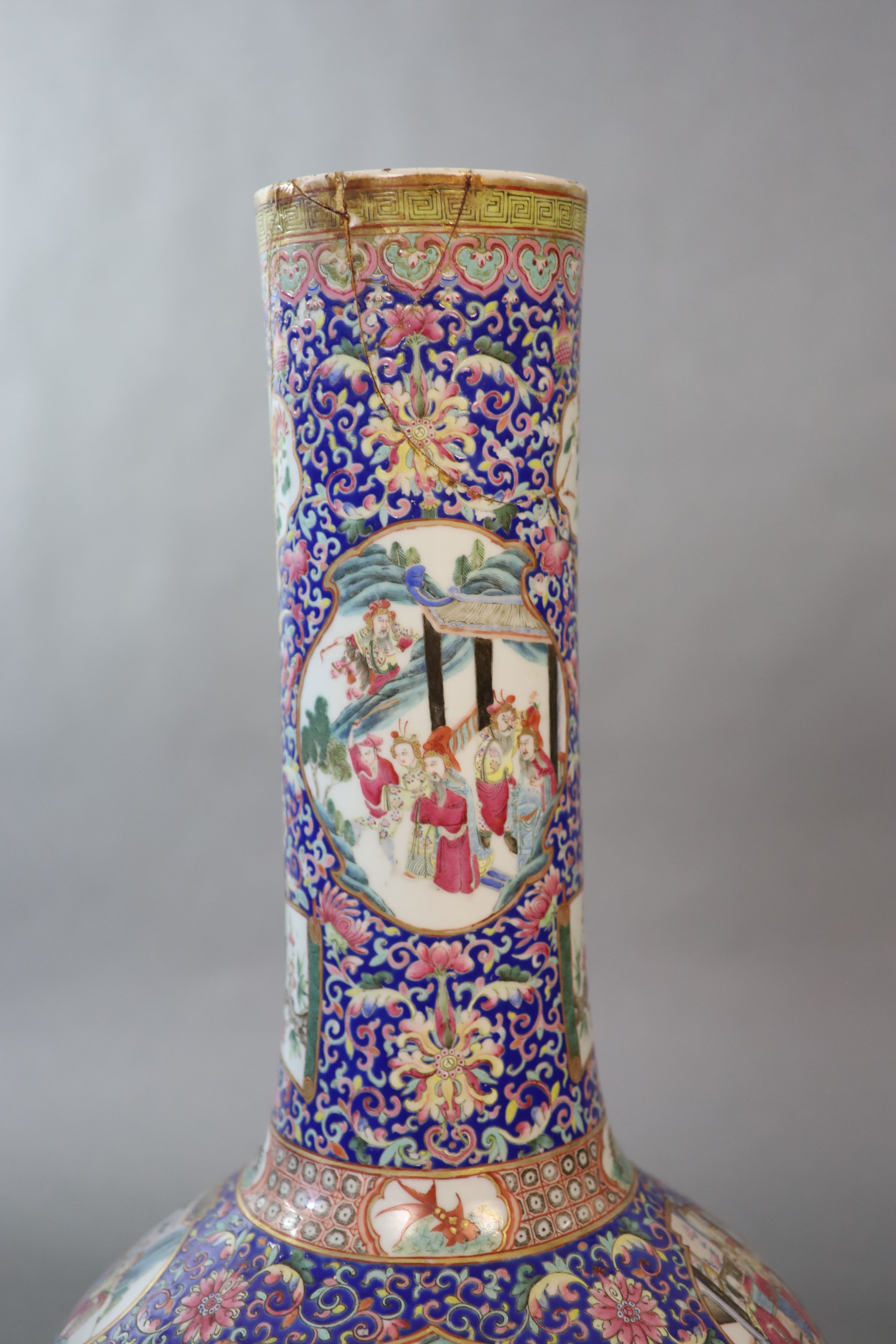 A massive Chinese blue ground bottle vase, Daoguang period (1821-50), 88cm high, neck broken and re-glued